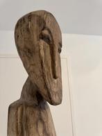 Houten sculptuur / totempaal, Ophalen
