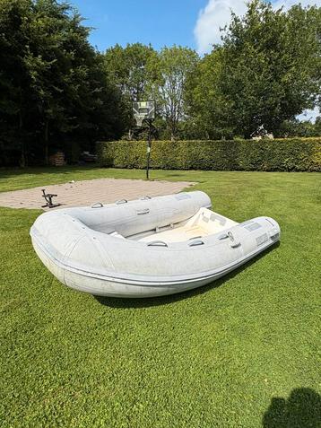 Caribe rubberboot met polyester bodem,optioneel met 6pk moto beschikbaar voor biedingen