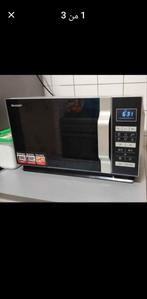 Zo goed als nieuwe Sharp magnetron, Ophalen of Verzenden