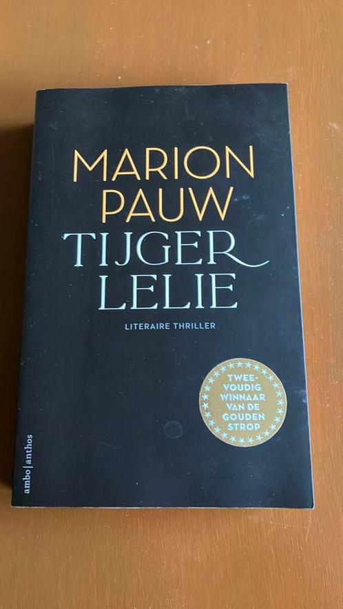 Marion Pauw - Tijgerlelie, Boeken, Thrillers, Zo goed als nieuw, Nederland, Ophalen of Verzenden