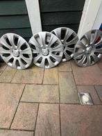 Continental Winterbanden op stalen velg + Skoda wieldoppen, Auto diversen, Wieldoppen, Ophalen, Gebruikt