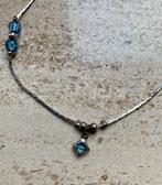 Armband zilverkleurig met blauwe steentjes, Ophalen of Verzenden, Gebruikt, Zilver, Staal