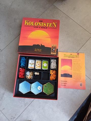 bordspel de Kolonisten v Catan basisspel met houten speelst beschikbaar voor biedingen