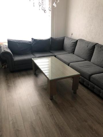 Grote grijze hoekbank