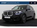 BMW iX1 eDrive20 M Sport / Panoramadak / Trekhaak / Sportsto, LED verlichting, Gebruikt, Met garantie (alle), Zwart