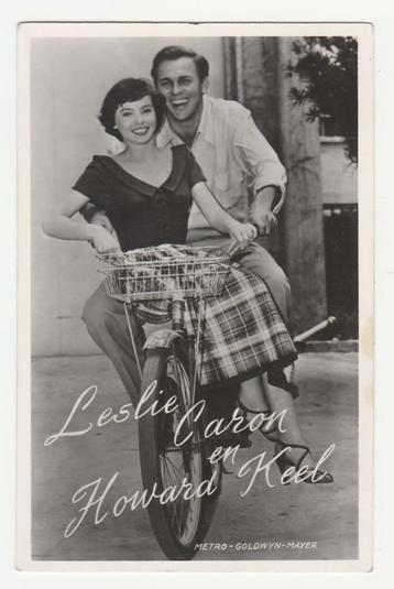 Leslie Caron en Howard Keel.  Filmsterren.  Fietsen.  Movies beschikbaar voor biedingen
