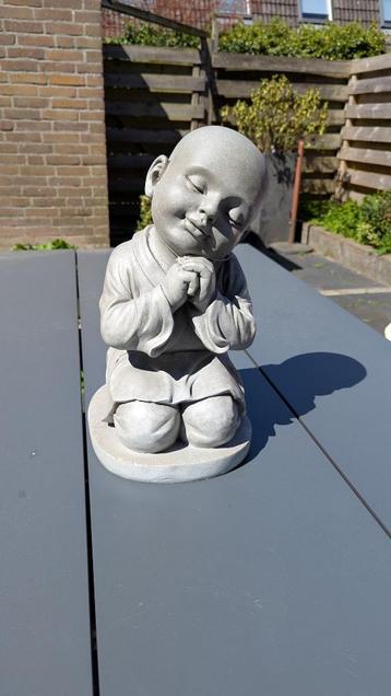 Boeddha tuinbeeld beschikbaar voor biedingen