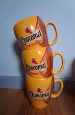 4 limited edition chocomel bekers mokken, Huis en Inrichting, Keuken | Servies, Ophalen of Verzenden, Zo goed als nieuw, Overige stijlen