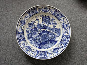 Delfts blauw wandbord met pauw, gefabriceerd door Ram Arnhem beschikbaar voor biedingen