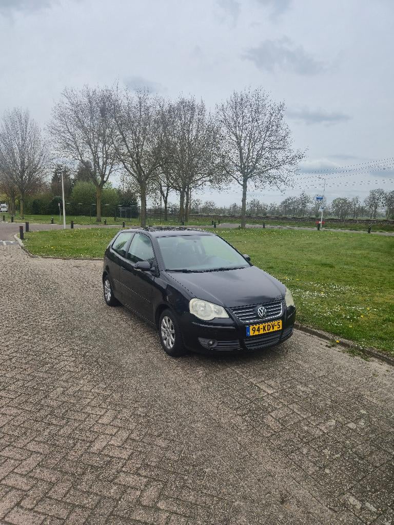 Volkswagen Polo 1.4 63KW FSI 2006 Zwart, Voorwielaandrijving, Stof, 4 cilinders, Metallic lak