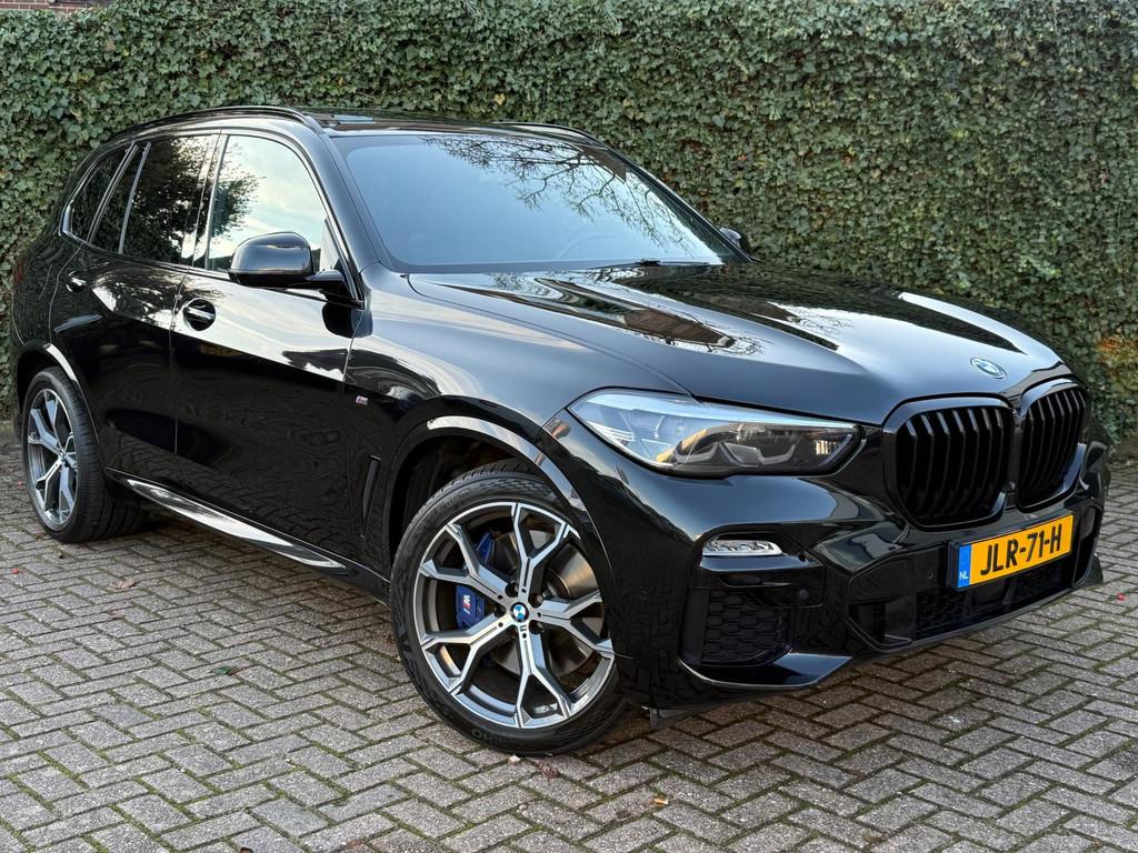 BMW X5 XDrive45e High Executive M-Sport | Achteras bestuurin, Auto's, Gebruikt, Zwart, Vierwielaandrijving, Hybride Elektrisch/Benzine