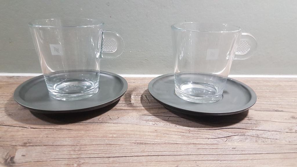 Nespresso koffiekopjes met schotel., Huis en Inrichting, Ophalen of Verzenden, Overige stijlen, Kop(pen) en/of Schotel(s), Glas