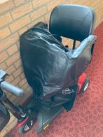 Beschermhoes voor op de scootmobiel, Ophalen