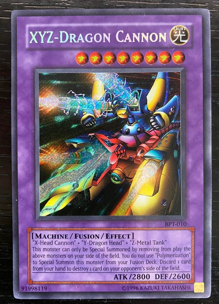 Yu-Gi-Oh! XYZ-Dragon Cannon BPT Old Tim Promo !, Ophalen of Verzenden, Zo goed als nieuw, Losse kaart, Foil