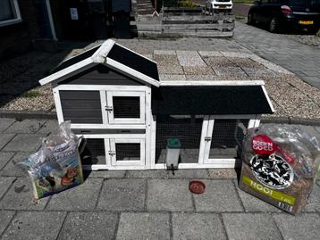 Konijnenhok met bijhorende spullen beschikbaar voor biedingen