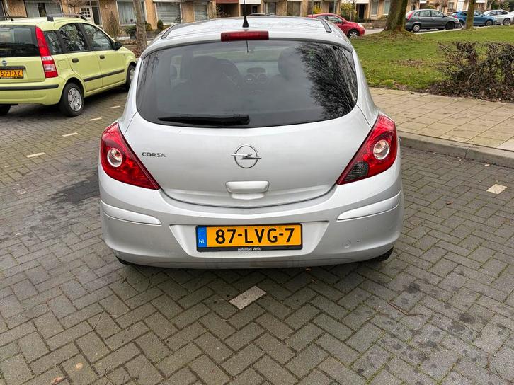 Opel Corsa 1.4 16V 3D 2010 Grijs, Auto's, Opel, Particulier, Corsa, Airbags, Airconditioning, Boordcomputer, Cruise Control, Elektrische ramen