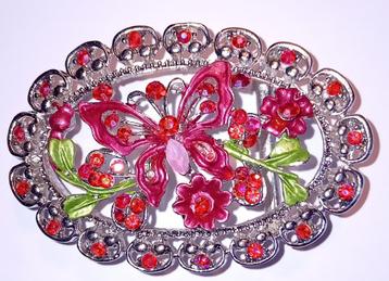 vlinder gesp met roode strass beschikbaar voor biedingen