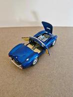Prachtige, metallic blauwe Cobra,1965,Burago,izgst, Hobby en Vrije tijd, Ophalen of Verzenden, Nieuw, Auto, Bburago