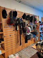 Winkelstellingen met slatwall, Ophalen