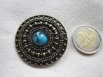 3.  Heel aparte oude broche, Ophalen