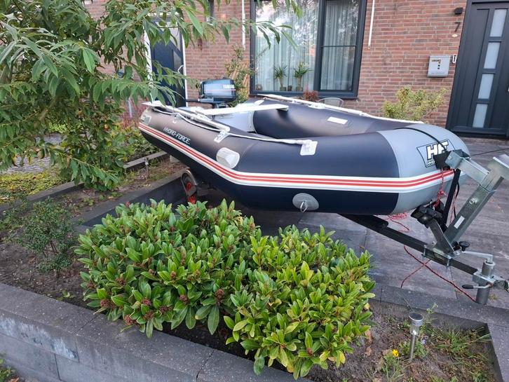 Rubberboot met motor en trailer, Watersport en Boten, Bootonderdelen, Nieuw, Motor en Techniek, Motorboot, Ophalen