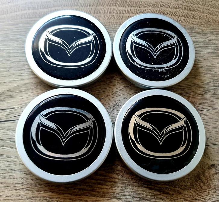 ORIGINELE MAZDA NAAFDOPPEN 59mm Zwart /Silver, Auto diversen, Wieldoppen, Gebruikt, Ophalen of Verzenden