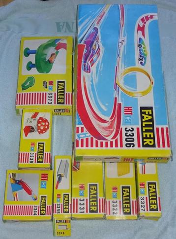 Faller Hit Car 8 doosjes met diverse onderdelen - jaren 70 beschikbaar voor biedingen