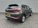 Hyundai Tucson 1.6 GDi Premium | Navigatie | Stoelverwarming, Voorwielaandrijving, Lichtsensor, 4 cilinders, Bruin