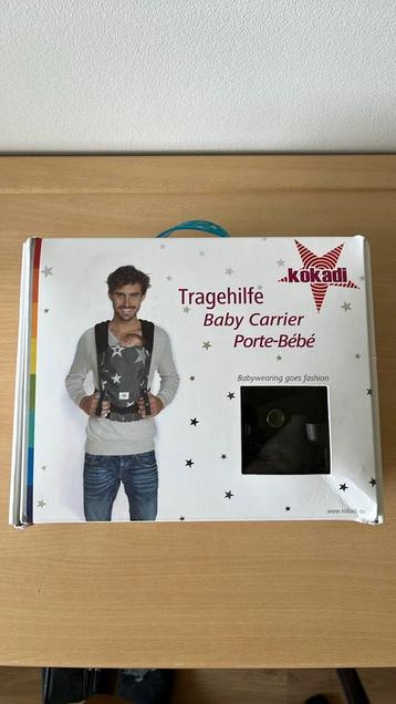 Baby draagzak (Kokadi) beschikbaar voor biedingen