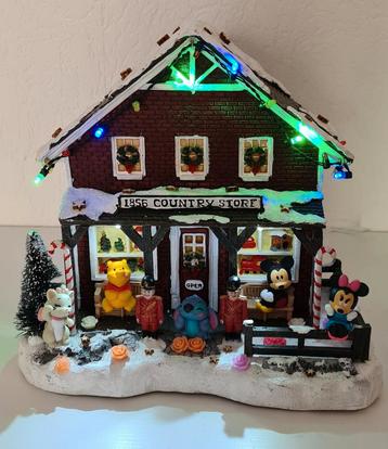 Prachtig kerstdorp met o,a
minnie,mickey,marie.winnie.Stitch beschikbaar voor biedingen