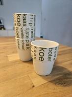 Set van 4 bekers met zuivelteksten, Huis en Inrichting, Keuken | Servies, Keramiek, Nieuw, Ophalen of Verzenden, Overige stijlen