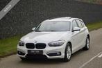 BMW 1-Serie 118i Urban| Parelmoer Wit - Schuifdak - Navi Pro, 65 €/maand, Gebruikt, 4 cilinders, Leder en Stof