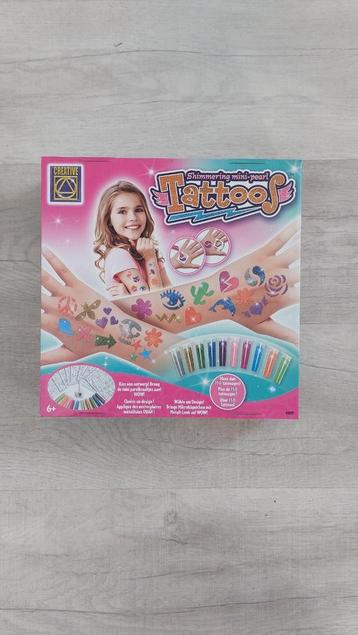 Parel tattoo beschikbaar voor biedingen