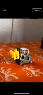 Heftruck met gasflessen, Ophalen of Verzenden, Gebruikt, Bus of Vrachtwagen