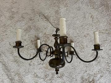 Antieke koperen kroonluchter beschikbaar voor biedingen