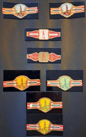 17 sigarenbandjes waarop de Domtoren is afgebeeld beschikbaar voor biedingen