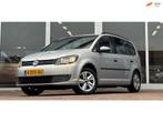 Volkswagen Touran 1.6 TDI Trendline BlueMotion Navi PDC Trek, Euro 5, Stof, Gebruikt, Zwart