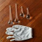 Druppels voor onder een lamp, Ophalen