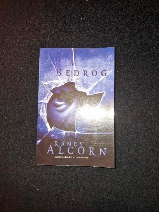 Randy Alcorn - Het bedrog, Boeken, Thrillers, Zo goed als nieuw, Ophalen of Verzenden