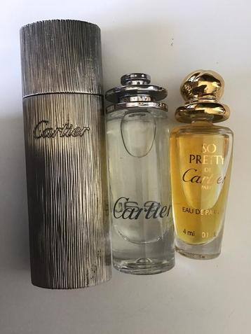 Zeldzame vintage zilveren Cartier houder met gratis parfums beschikbaar voor biedingen