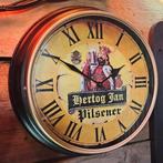 Mooie robuuste HERTOG JAN wandklok met metalen rand, Verzamelen, Biermerken, Ophalen of Verzenden, Nieuw, Reclamebord, Plaat of Schild