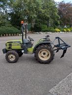 minitrekker met woelpoot en chauffeur, Ophalen, Tuinaarde