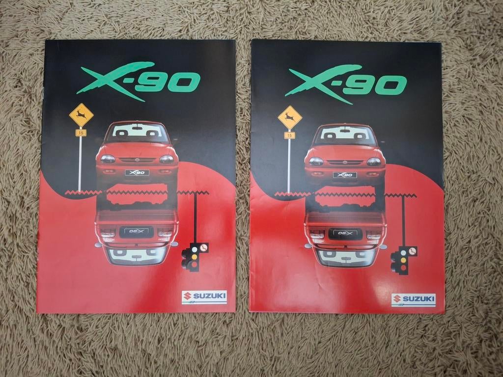 2x autofolder Suzuki X-90, Verzenden, Zo goed als nieuw, Overige merken