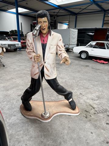 Elvis presley met microfoon beschikbaar voor biedingen