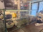 Glazen vitrine display, Ophalen