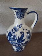 Delfts blauwe vaas, Ophalen