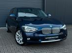 BMW 1-serie 116i Urban |MF-STUUR|CRUISE|CLIMATE|LEER|XENON, Auto's, Gebruikt, 4 cilinders, Met garantie (alle), Blauw