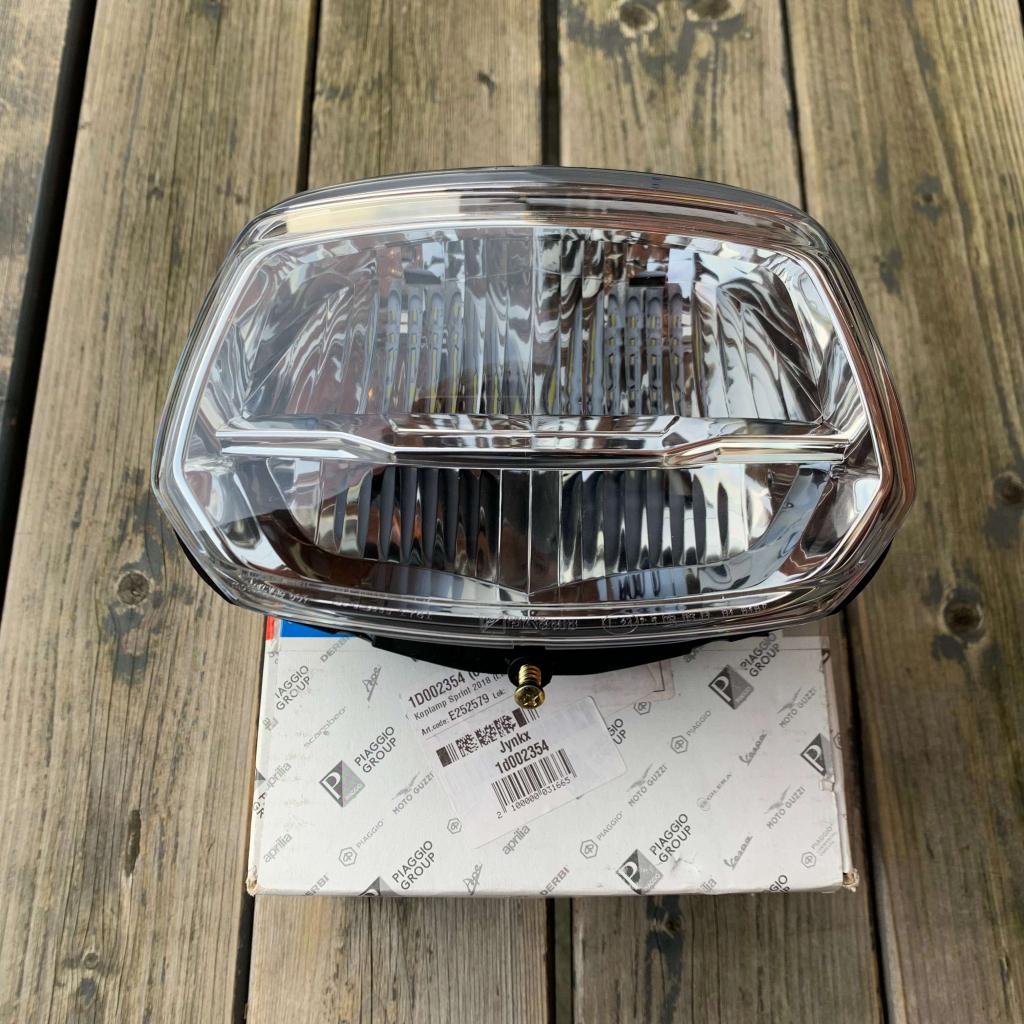 UITVERKOOP! LED koplamp Vespa Sprint origineel NIEUW, Info@jynkx.com, Jynkx, Nieuw, Ophalen of Verzenden