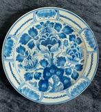 Delfts blauw bord, Ophalen