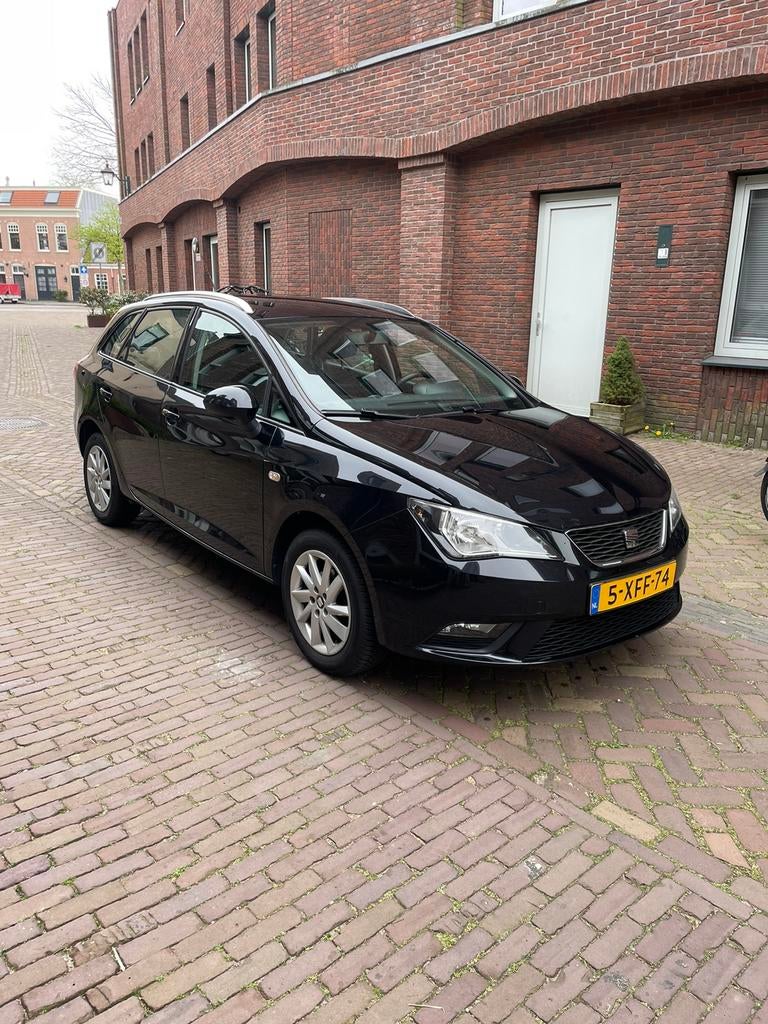 Seat Ibiza 1.2 63KW ST 2013 Zwart, Auto's, Voorwielaandrijving, Stof, 40 €/maand, Stationwagon